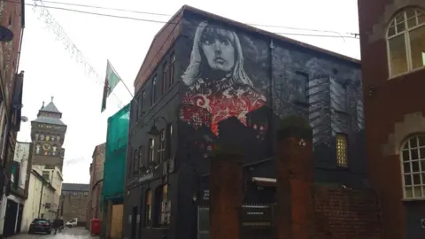 BBC Artwork featuring musician Gwenno, outside Clwb Ifor Bach in Cardiff