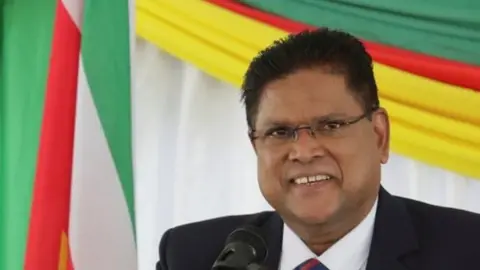 Reuters Chandrikapersad Santokhi speaks during a news conference after being elected as Suriname"s new President, at the National Assembly, in Paramaribo, Suriname July 13, 2020