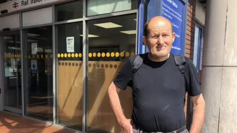 Victoria Scheer/BBC Royston resident Gary Seymour outside Barnsley station