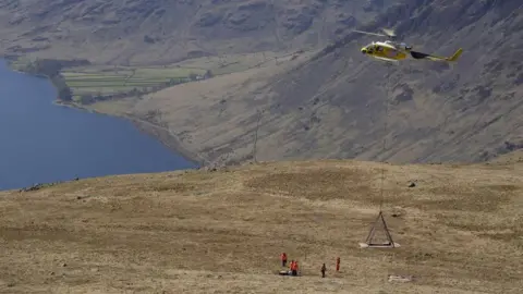 PA Media Helicopter used to winch equipment onto Scafell Pike