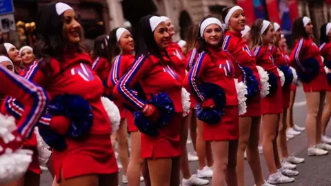 PA Media Cheerleaders taking part in the New Year's Day Parade in London