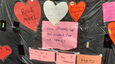 Messages posted on the defaced mural