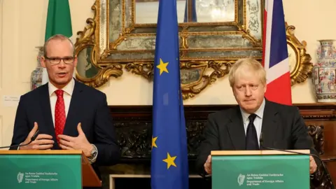 PAUL FAITH/afp/gettyimages Simon Coveney and Boris Johnson in Dublin in November 2017