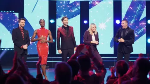 Getty Images Presenters Joel Dommett, Aj Odudu, David Tennant, Zoe Ball and Paddy McGuiness during the Red Nose Day