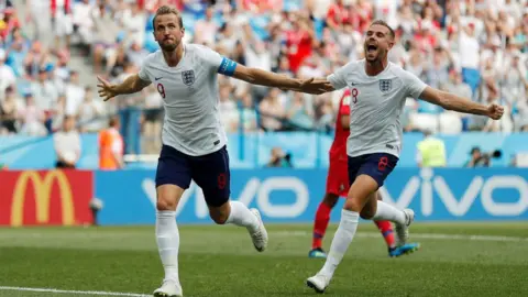 Reuters Harry Kane and Jordan Henderson