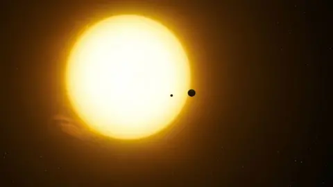 Dan Durda Artist’s impression of the exoplanet Kepler-1625b transiting the star with the candidate exomoon in tow.