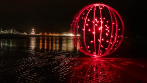Kevin Jay Orb of light created by light painting technique at Clacton beach