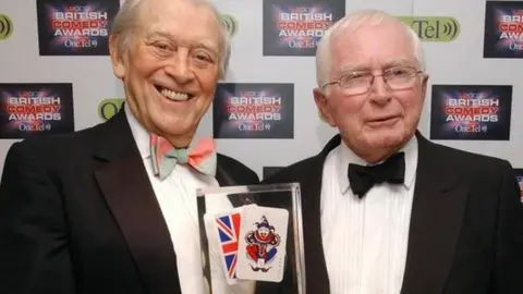 PA Jimmy Perry (left) and David Croft with their lifetime achievement award during the annual British Comedy Awards