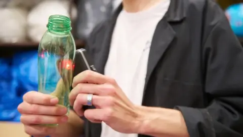 James Dyson Award Plastic scanner on a bottle