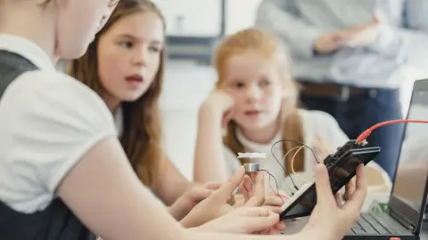 Getty Images Girls in a computing lesson