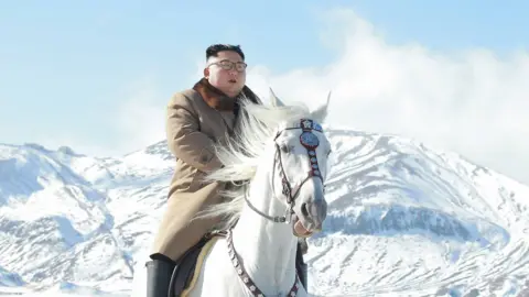 EPA North Korean leader Kim Jong Un rides a horse during snowfall in Mount Paektu