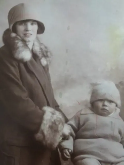 AFP Derek Stanton as a baby with his mother Winifred