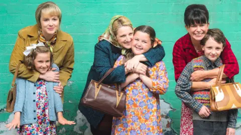 BBC Mothers and children from Aberfan: The Green Hollow (left to right) - Kimberley Nixon and Nell Olivia James; Shelley Rees and Tegan James; Eve Myles and Christopher Benning