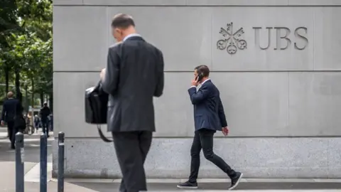 Getty Images Workers outside UBS in Switzerland