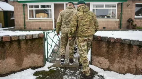 Getty Images Military men