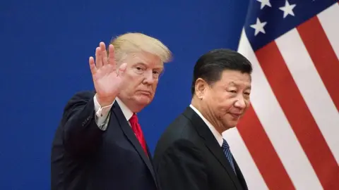 AFP/Getty This file picture taken on November 9, 2017 shows US President Donald Trump (L) and China"s President Xi Jinping leaving a business leaders event at the Great Hall of the People in Beijing.