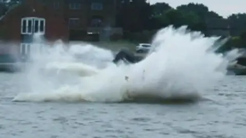 Ryan Prewer Powerboat flipping over in the water.