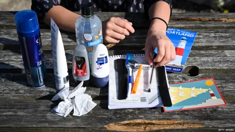 Getty Images Goody bag contains toiletries, notebook and local phone number