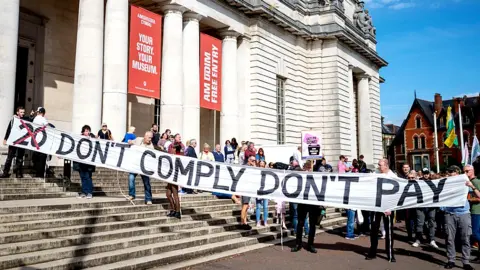 Getty Images Protesters outside Cardiff Museum