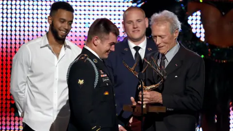 Getty Images Anthony Sadler, Alek Skarlatos, and Spencer Stone with Clint Eastwood