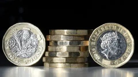 DANIEL SORABJI/AFP/GETTY Pound coins