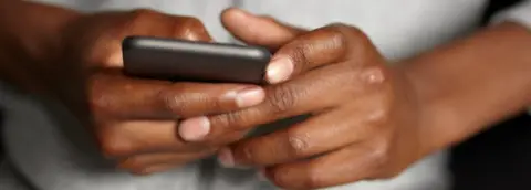 Getty Images Person on mobile phone