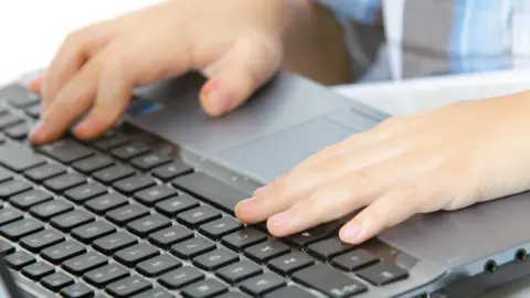 Getty Images boy typing