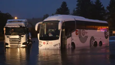 kevin mcglynn Bus and lorry in water at Oban