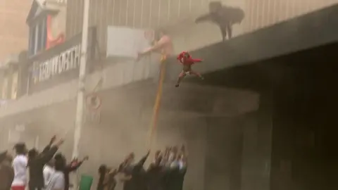 Child thrown from building