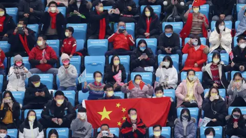 Getty Images Spectators look on during the Men Single Skating Free Skating on day six of the Beijing 2022 Winter Olympic Games