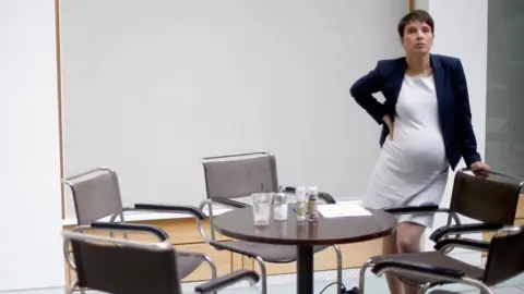 Reuters Frauke Petry, pregnant, at a table surrounded by chairs