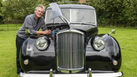 Neil Phillips photo and film Limited Jo Burge with the hearse