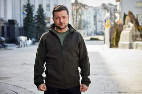 Getty Images President Volodymyr Zelensky now lives in his office on Bankova Street (left)