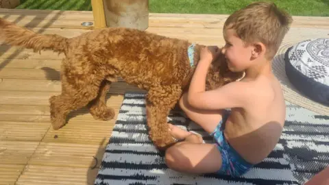 Family handout Elvis with Oscar