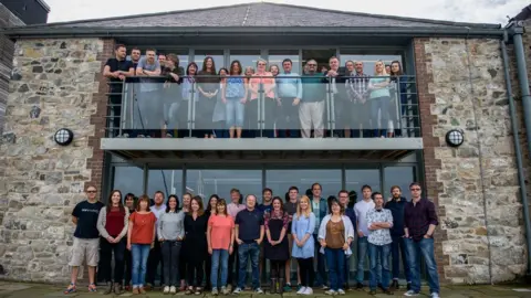 Cwmni Da Workers outside Cwmni Da's offices in Caernarfon