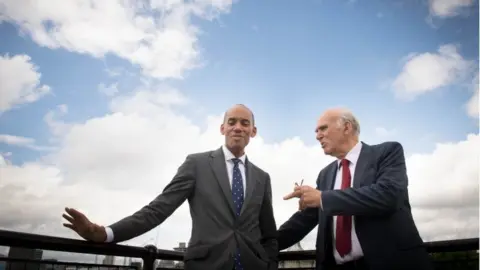 PA Chuka Umunna and Vince Cable