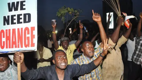 AFP Youths celebrate on March 31, 2015 the victory of main opposition All Progressives Congress (APC) presidential candidate Muhammadu Buhari in Abuja