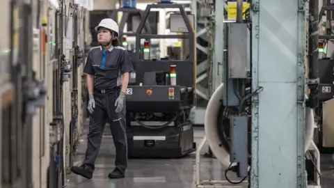 Getty Images A worker at a Nissan factory in Yokohama, Japan.