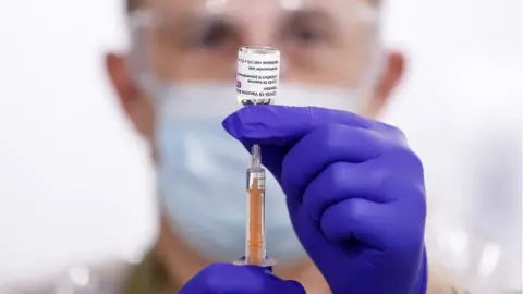 PA Media covid vaccine