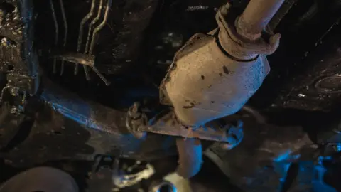 Getty Images Catalytic converter car machinery