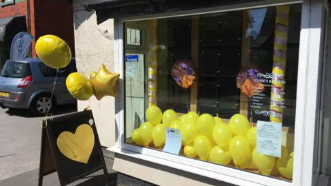 AFP yellow balloons