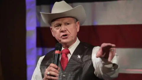 Getty Images Republican Senate candidate Roy Moore speaks at a campaign rally on September 25, 2017