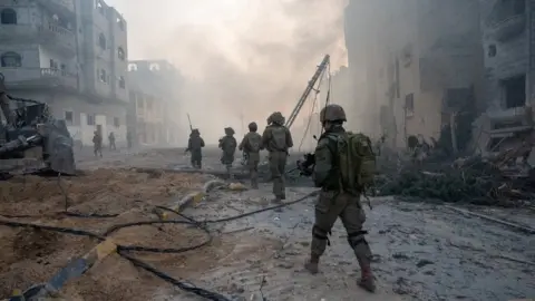 ISRAEL DEFENSE FORCES Israel Defense Forces handout showing Israeli soldiers operating inside the Gaza Strip (21 January 2024)