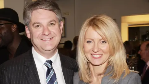 A Davidson/Shutterstock Philip Davies and Esther McVey in 2018