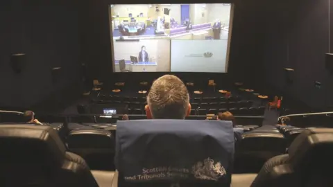 PA Media Edinburgh's Odeon cinema being used for a pilot remote courtroom for jurors