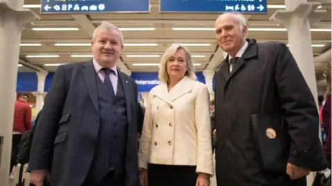 PA SNP Westminster leader Ian Blackford, Plaid Cymru Westminster leader Liz Saville-Roberts and Liberal Democrats leader Vince Cable at St Pancras station before heading to Brussels