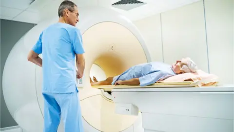 Getty Images Man having an MRI scan