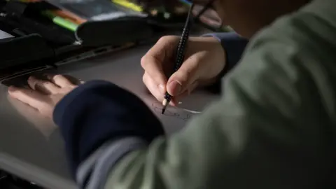 PA Media pupil drawing in class