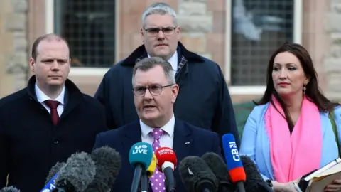 MARK MARLOW/EPA-EFE/REX/Shutterstock DUP leader Jeffrey Donaldson with party colleagues