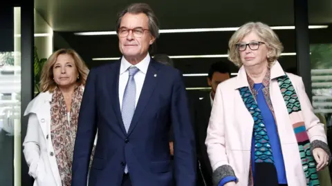 EPA Artur Mas (C); former regional minister Irene Rigau (R), and former regional minister Joana Ortega (L), leave the Spanish Court of Auditors in Madrid, Spain, 10 October